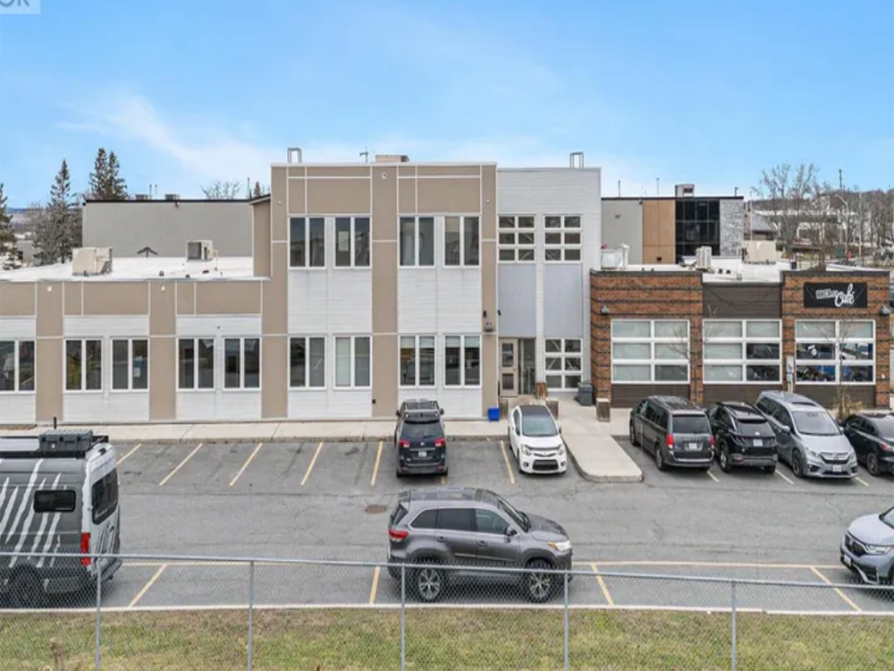 511 Lacolle Way, Ottawa — modern commercial building with clean architectural lines, ample parking space, and professional curb appeal.