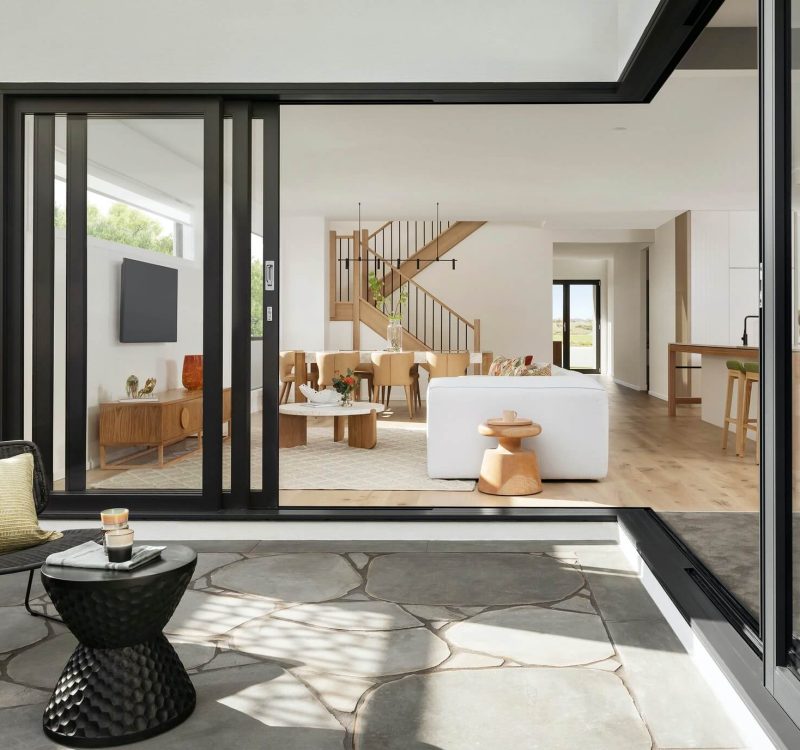 Modern House Design with Contemporary Architecture Stylish modern house exterior featuring geometric lines, minimalist design, and expansive glass elements.